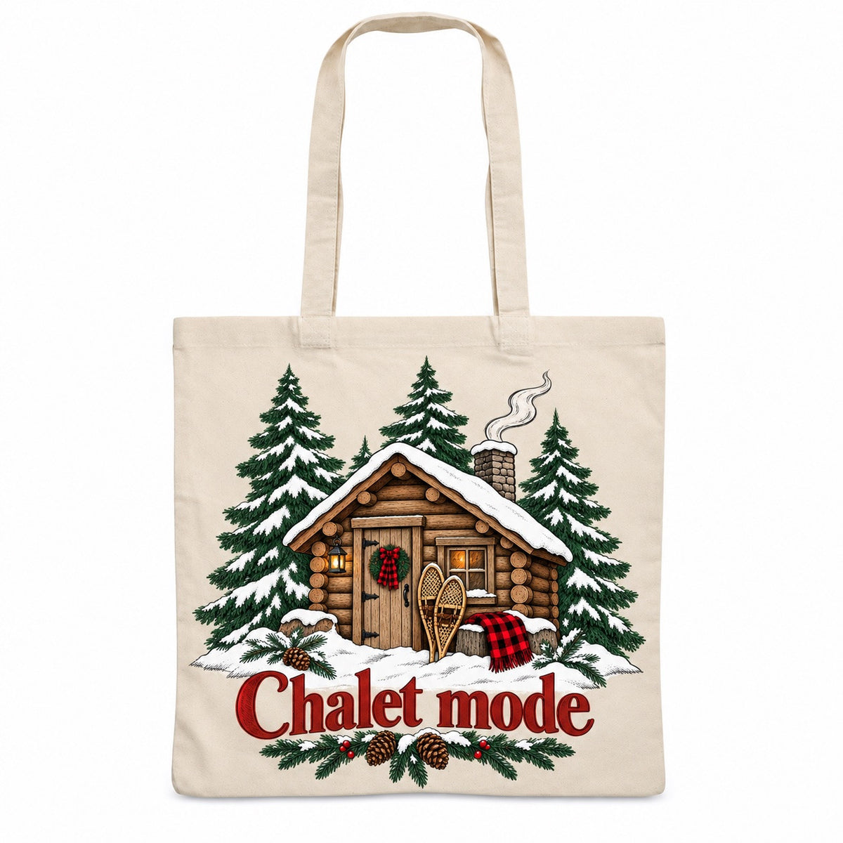 Tote bag « Chalet mode » Essentiel, sac plat en coton naturel 140 g/m² de 38 × 42 cm, illustration à l'encre : une cabane en rondins enneigée, trois sapins élancés et une paire de raquettes traditionnelles appuyées contre la porte