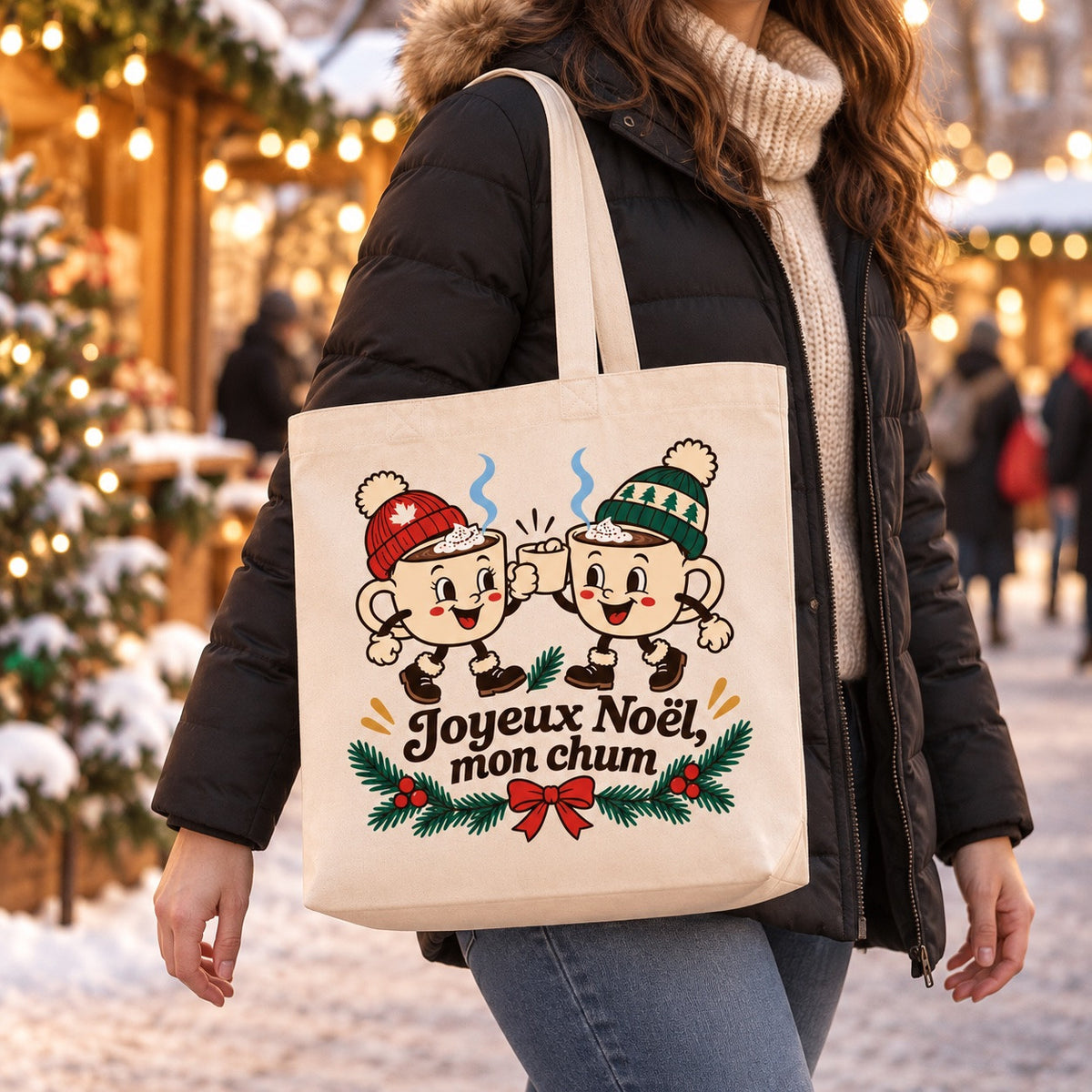 Tote bag « Joyeux Noël, mon chum » Premium porté à l'épaule dans une rue québécoise en hiver