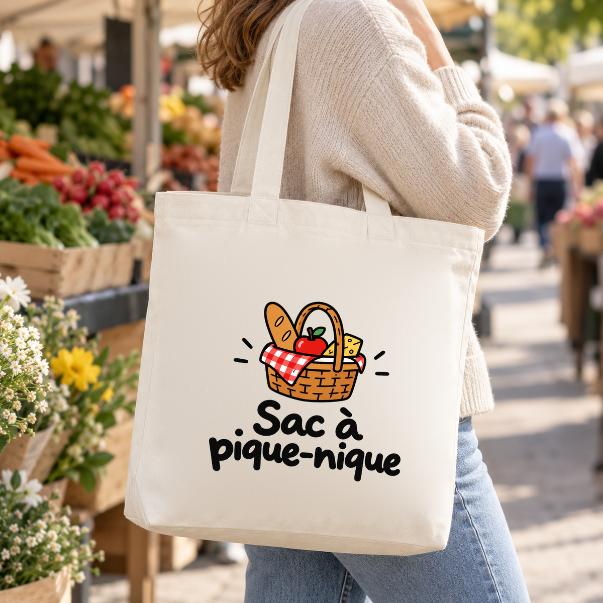 Tote bag « Sac à pique-nique » Premium porté à l'épaule dans une allée de marché