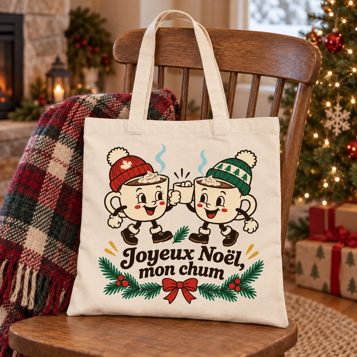 Tote bag « Joyeux Noël, mon chum » Essentiel posé sur une chaise, décor d'hiver