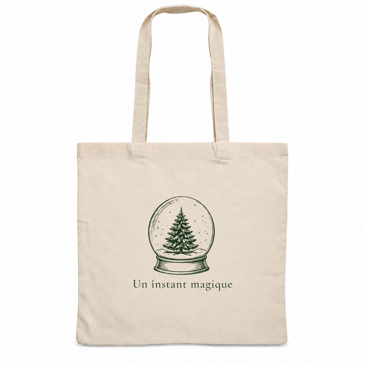 Tote bag de Noël « Un instant magique » Essentiel, sac plat en coton naturel 140 g/m² de 38 × 42 cm, dessin minimaliste au trait : une boule à neige et son sapin, en vert sapin