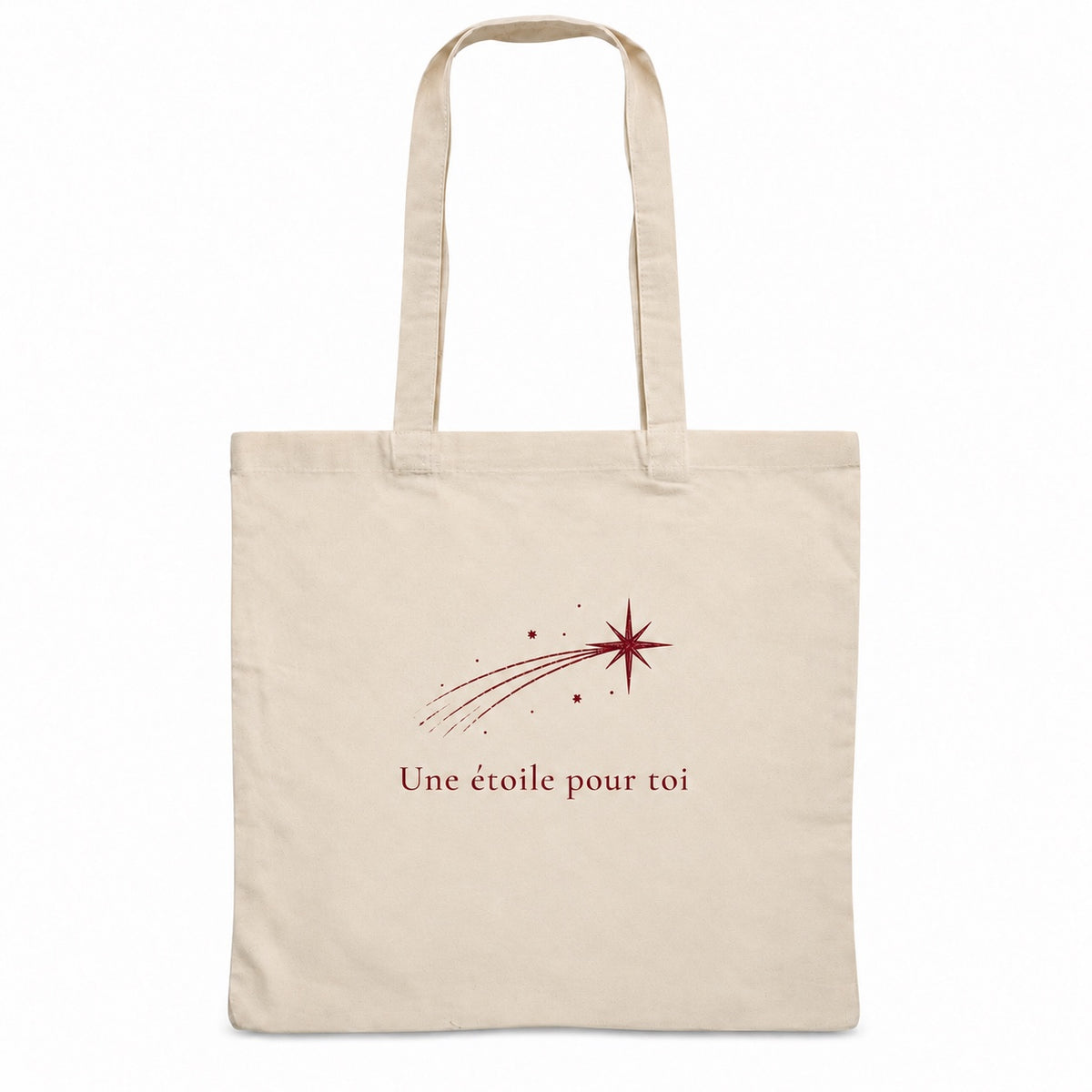 Tote bag de Noël « Une étoile pour toi » Essentiel, sac plat en coton naturel 140 g/m² de 38 × 42 cm, dessin minimaliste au trait : une étoile filante, en bordeaux